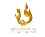 A gold logo of the world association of nuad thai and spa.