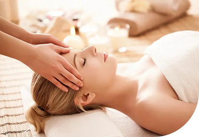 Girl head massage in spa salon.
